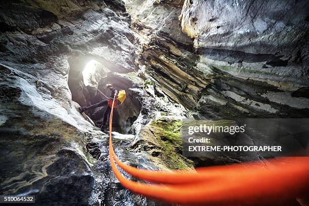 extreme canyoning adventure - carabiner stock pictures, royalty-free photos & images