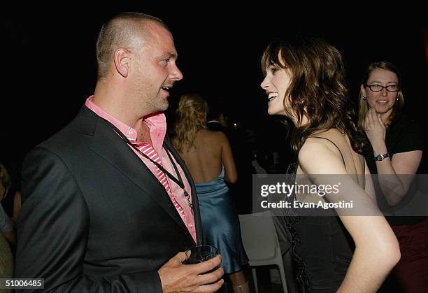 Actor Ray Stevenson chats with actress Keira Knightley at the "King Arthur" world premiere after-party at The Cathedral Church of St. John The...