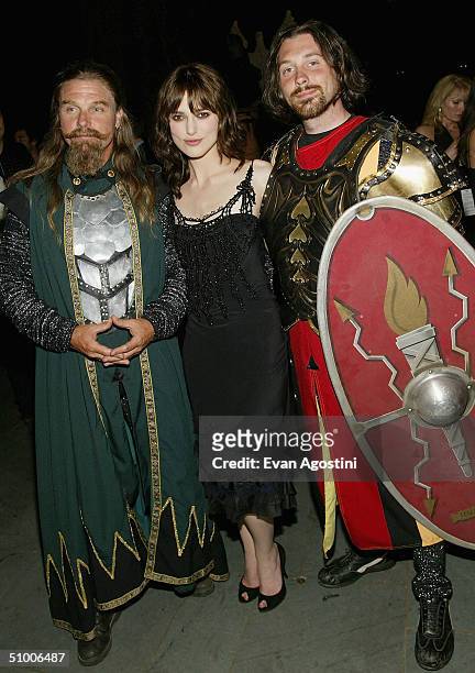 Actress Keira Knightley poses with knights at the "King Arthur" world premiere after-party at The Cathedral Church of St. John The Divine on June 28,...