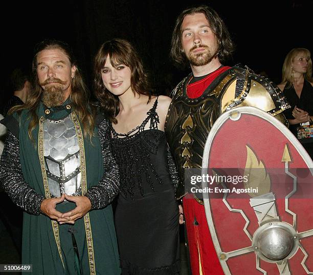 Actress Keira Knightley poses with knights at the "King Arthur" world premiere after-party at The Cathedral Church of St. John The Divine on June 28,...