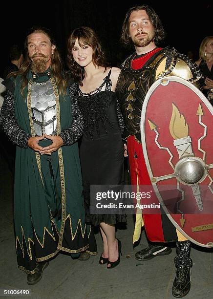 Actress Keira Knightley poses with knights at the "King Arthur" world premiere after-party at The Cathedral Church of St. John The Divine on June 28,...