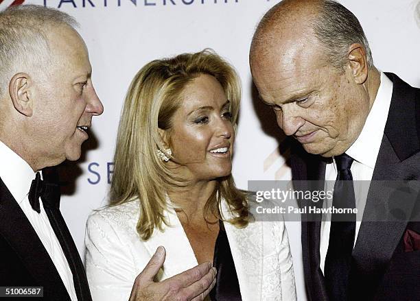 Samuel J. Heyman, Chairman of International Specialty Products talks with Former Senator Fred Thompson and his wife Jeri as they pose for a photo at...