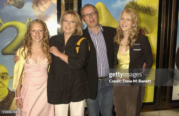 Actress Jennifer Saunders with husband Ade Edmondson and daughters Freya and Beatrice arrive at the UK Charity Premiere of 'Shrek 2' at the Empire...