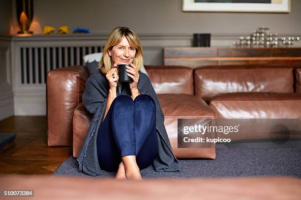 staying warm in cozy - hot indoors stock pictures, royalty-free photos & images