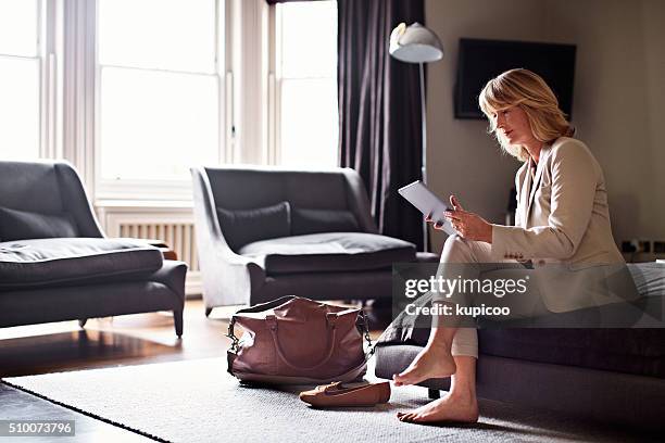 getting her business trip in order - businesswoman hotel stock pictures, royalty-free photos & images