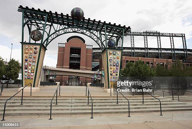 General view of the ball themed archway leading to Coors Field, home of the Colorado Rockies on June 14, 2004 in Denver, Colorado.