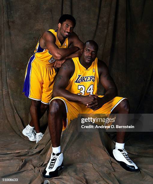 Kobe Bryant and Shaquille O'Neal of the Los Angeles Lakers pose for a picture circa 2000 in Los Angeles, California. NOTE TO USER: User expressly...