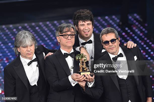 Italian Band Stadio , winners of the 66th Italian Music Festival in Sanremo, pose with the award at the Ariston theatre during the closing night on...