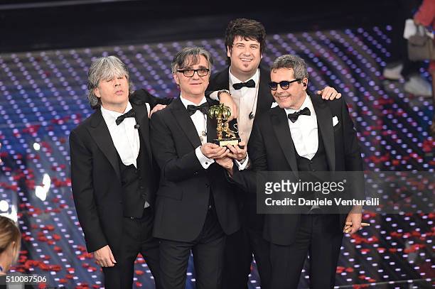 Italian Band Stadio , winners of the 66th Italian Music Festival in Sanremo, pose with the award at the Ariston theatre during the closing night on...