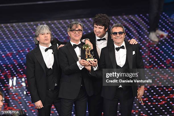 Italian Band Stadio , winners of the 66th Italian Music Festival in Sanremo, pose with the award at the Ariston theatre during the closing night on...