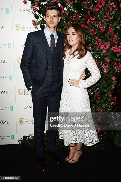 Jim Chapman and Tanya Burr attend the Lancome BAFTA nominees party at Kensington Palace on February 13, 2016 in London, England.