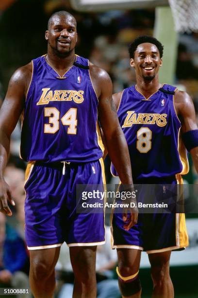 Shaquille O'Neal and Kobe Bryant of the Los Angeles walk upcourt circa 2000. NOTE TO USER: User expressly acknowledges and agrees that, by...