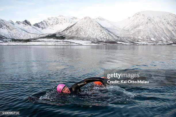 Espen Moe leads during the swim during the The Arctic Triple - Lofoten X on February 13, 2016 in Svolvar, Norway. Athletes choose to swim in a...