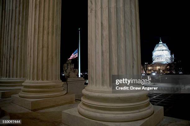 The American flag flies at half mast at the U.S. Supreme Court February 13, 2016 in Washington, DC. Supreme Court Justice Antonin Scalia was at a...