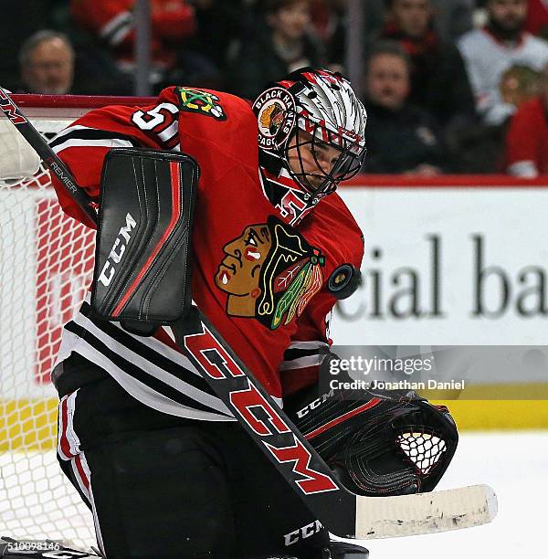 Corey Crawford of the Chicago Blackhawks makes a save against the Anaheim Ducks at the United Center on February 13, 2016 in Chicago, Illinois.