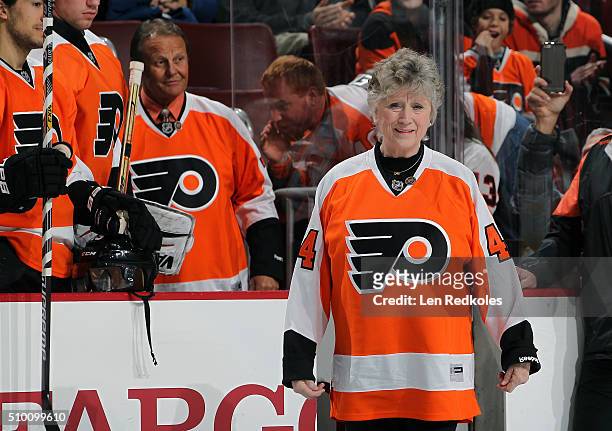 Donna Ashbee walks to center ice for a pregame ceremony to unveil the new 50th anniversary logo prior to the Philadelphia Flyers game against the...