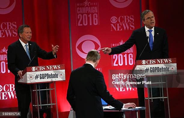 Republican presidential candidates Ohio Governor John Kasich and Jeb Bush participate in a CBS News GOP Debate February 13, 2016 at the Peace Center...