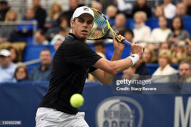 Sam Querrey of the United States returns a shot to Kei Nishikori of Japan during their semi-final singles match on Day 6 of the Memphis Open at the...