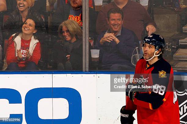 Former Miami Dolphin Quarterback Dan Marino enjoys the game with his wife Claire while the Florida Panthers host the Nashville Predators at the BB&T...