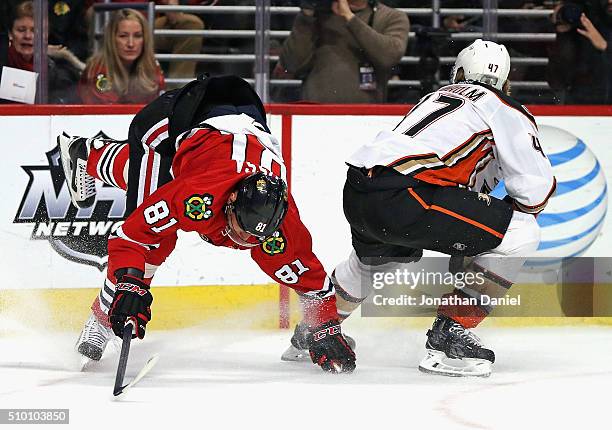 Marian Hossa of the Chicago Blackhawks suffering an injury after this collison with Hampus Lindholm of the Anaheim Ducks in the second period at the...