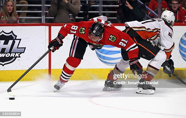 Marian Hossa of the Chicago Blackhawks suffering an injury after this collison with Hampus Lindholm of the Anaheim Ducks in the second period at the...