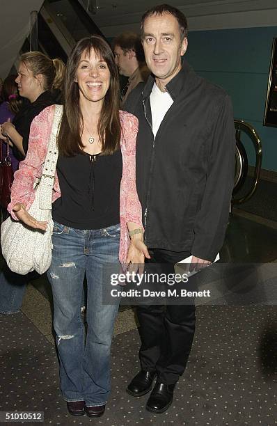 Presenter Angus Deayton with partner Lisa Meyer at the charity premiere of Michael Moore's controversial new film 'Fahrenheit 9/11' on June 29, 2004...