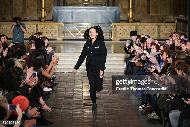 Alexander Wang greets the audience after presenting his Fall 2016 Collection at St. Bartholomew's Church on February 13, 2016 in New York City.