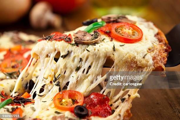 pizza sottile. - cheese slice foto e immagini stock