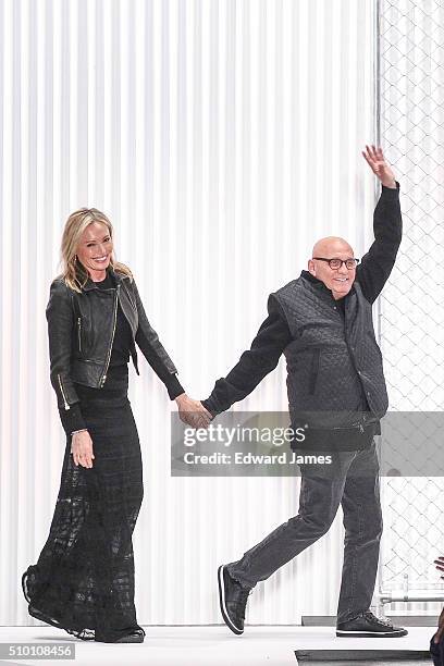 Designers Lubov Azria and Max Azria walk the runway during the Herve Leger by Max Azria fashion show at The Arc, Skylight at Moynihan Station on...