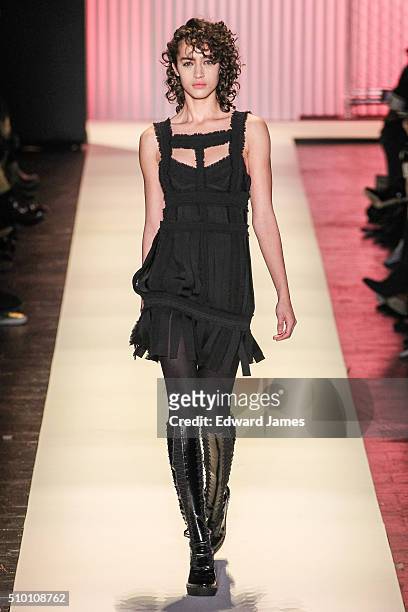 Model walks the runway during the Herve Leger by Max Azria fashion show at The Arc, Skylight at Moynihan Station on February 13, 2016 in New York...