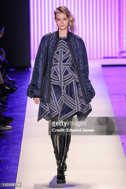Model walks the runway during the Herve Leger by Max Azria fashion show at The Arc, Skylight at Moynihan Station on February 13, 2016 in New York...