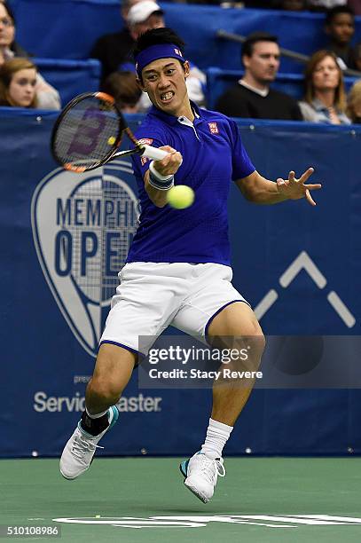 Kei Nishikori of Japan returns a shot to Sam Querrey of the United States during their semi-final singles match on Day 6 of the Memphis Open at the...