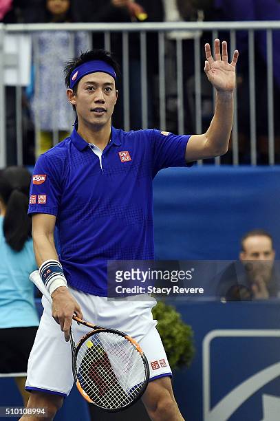 Kei Nishikori of Japan waves to the crowd following a victory over Sam Querrey of the United States in their semi-finals singles match at the Racquet...