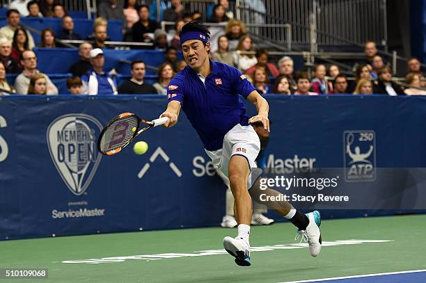 Kei Nishikori of Japan returns a shot to Sam Querrey of the United States during their semi-final singles match on Day 6 of the Memphis Open at the...