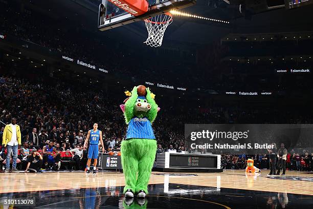 Stuff the Magic Dragon mascot holds the ball for Aaron Gordon of the Orlando Magic during the Verizon Slam Dunk Contest during State Farm All-Star...