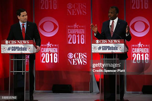 Republican presidential candidates Sen. Marco Rubio and Ben Carson participate in a CBS News GOP Debate February 13, 2016 at the Peace Center in...