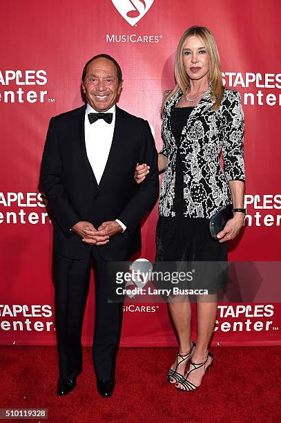 Musician Paul Anka and Lisa Pemberton attend the 2016 MusiCares Person of the Year honoring Lionel Richie at the Los Angeles Convention Center on...