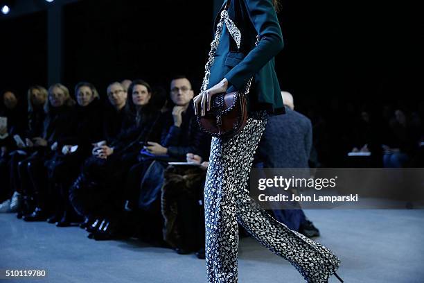 Models walk the runway, fashion and bag detail, during the Altuzarra show during the Fall 2016 New York Fashion Week on February 13, 2016 in New York...