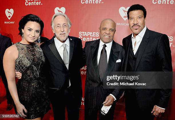 Recording artist Demi Lovato, Recording Academy and MusiCares President/CEO Neil Portnow, founder of Motown Records Berry Gordy and honoree Lionel...