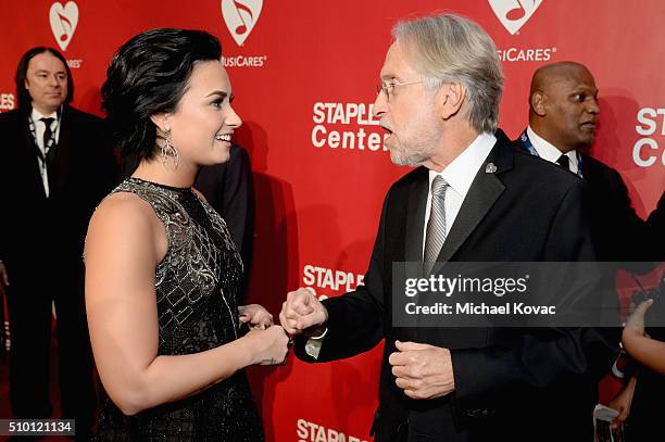 Recording artist Demi Lovato and Recording Academy and MusiCares President/CEO Neil Portnow attend the 2016 MusiCares Person of the Year honoring...