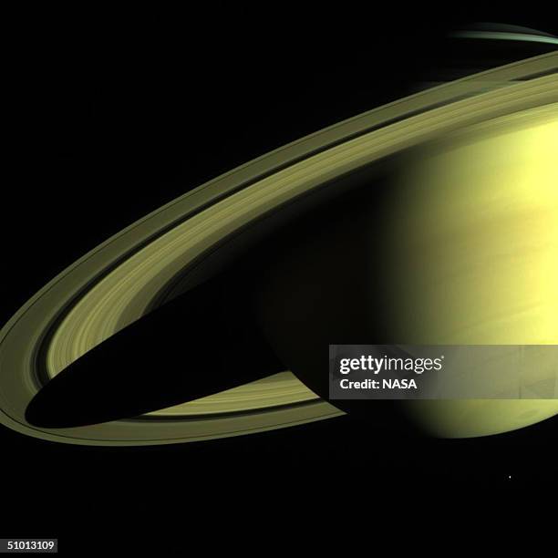 In this handout photo provided by NASA, Saturn appears in an image returned by the Cassini-Huygens spacecraft on May 16 when its imaging science...