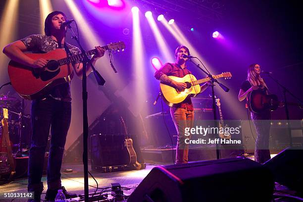 Singer/guitarists Elijah Edwards , Mason Van Valin and Megan McAllister of Fairground Saints at The Fillmore Charlotte on February 13, 2016 in...