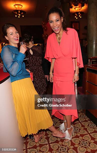 Jessica Schwarz , barefoot, and Annabelle Mandeng during the Bild 'Place to B' Party at Borchardt during the 66th Berlinale International Film...