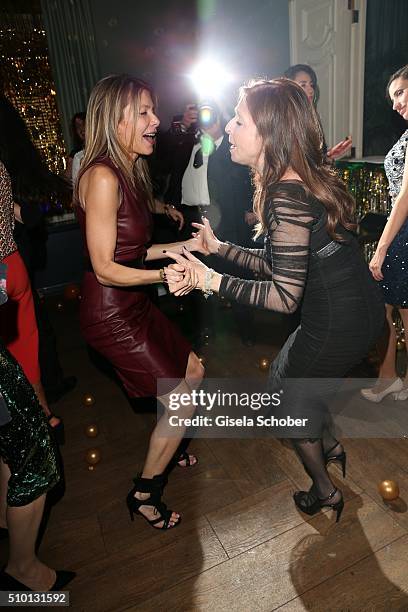 Vicky Leandros and Ursula Karven dance during the Bild 'Place to B' Party at Borchardt during the 66th Berlinale International Film Festival Berlin...