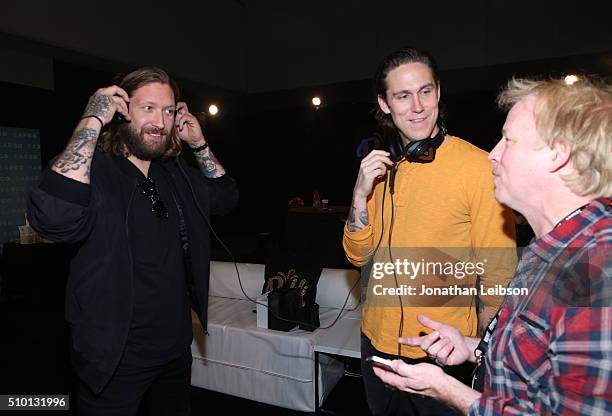 Musicians Chris Hayden and Robert Ackroyd of Florence and the Machine attend the gifting suite during the 2016 MusiCares Person Of The Year honoring...