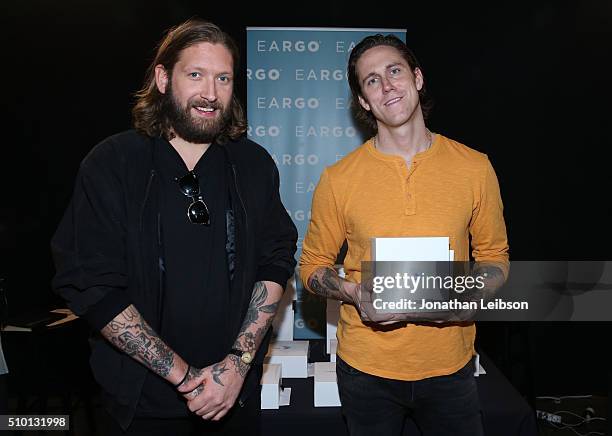 Musicians Chris Hayden and Robert Ackroyd of Florence and the Machine attend the gifting suite during the 2016 MusiCares Person Of The Year honoring...