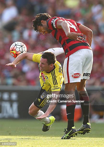 Blake Powell of the Phoenix and Nikolai Topor-Stanley of the Wanderers contest the ball during the round 19 A-League match between the Western Sydney...