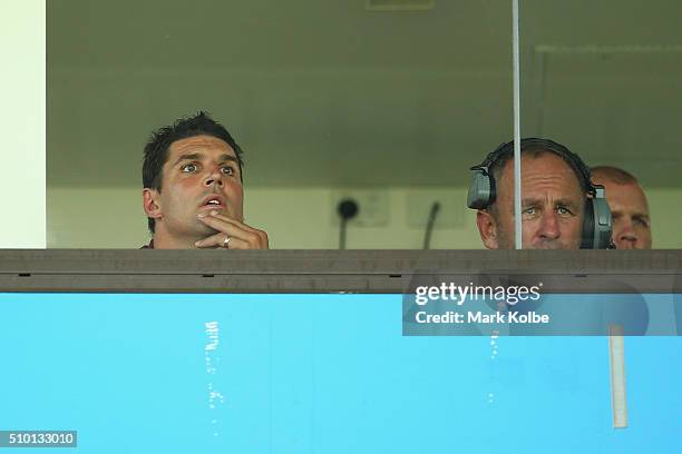 Eagles coach Trent Barrett and assistant coach John Cartwright watch on from the coaches box during the NRL Trial match between the Cronulla Sharks...