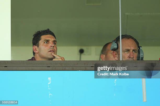 Eagles coach Trent Barrett and assistant coach John Cartwright watch on from the coaches box during the NRL Trial match between the Cronulla Sharks...