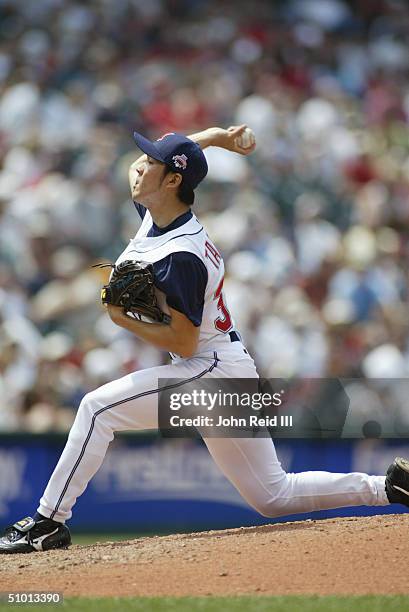 Kazuhito Tadano of the Cleveland Indians pitches against the Cincinnati Reds during the MLB game on June 13, 2004 at Jacobs Field in Cleveland, Ohio....